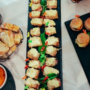 Retail Delicious platter of assorted mini sandwiches perfect for events and parties.